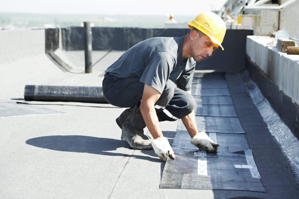 flat roof covering works with roofing felt